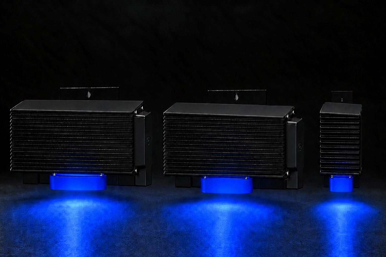 MTLx Pro Blue, OG Blue and Mini Blue fixtures with blue beacon optics lit